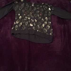 A girls sweater from justice size 12